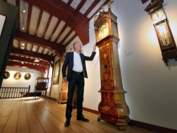 Director Hugo ter Avest with a special clock